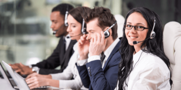 a group of telemarketers working in an office