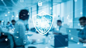 IT specialists working on the background with a lock icon in front